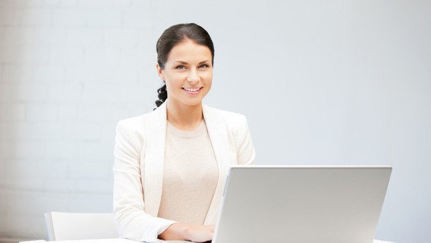 happy-woman-with-laptop-computer-xs